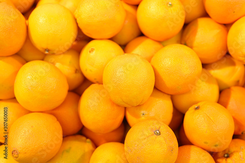 background of a bunch of juicy orange oranges