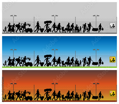 Immigrants silhouette in front of boundary wires