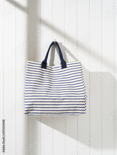 stripe bag on white wall