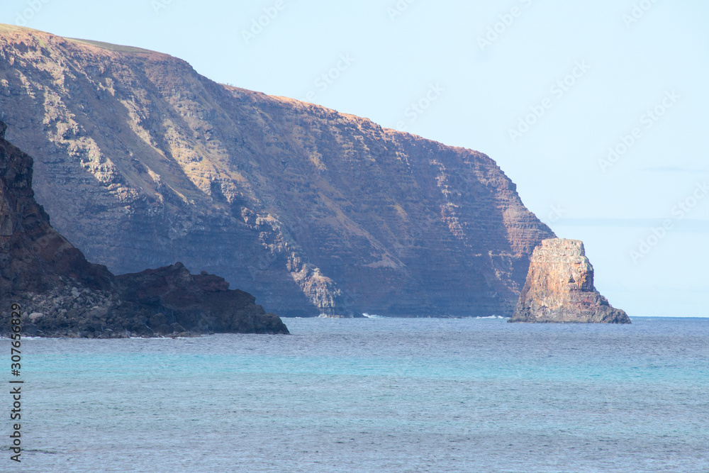 The wild coasts of Easter Island with the cliffs of the Poike volcano. Easter Island, Chile