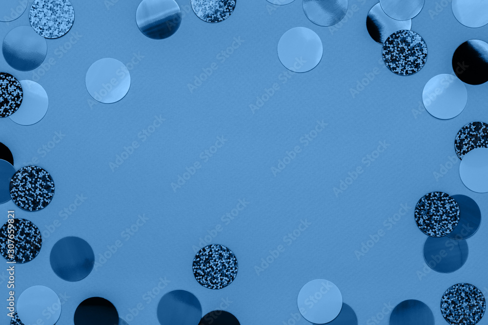 Carnival decorations Festive classic confetti on blue color background new year 2020. - obrazy, fototapety, plakaty 