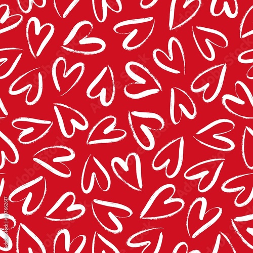 Vector seamless romantic pattern with hand drawn hearts. White doodle hearts on trendy lava red color background. Ready template for design, print, poster, party, Valentine's day, vintage textile.