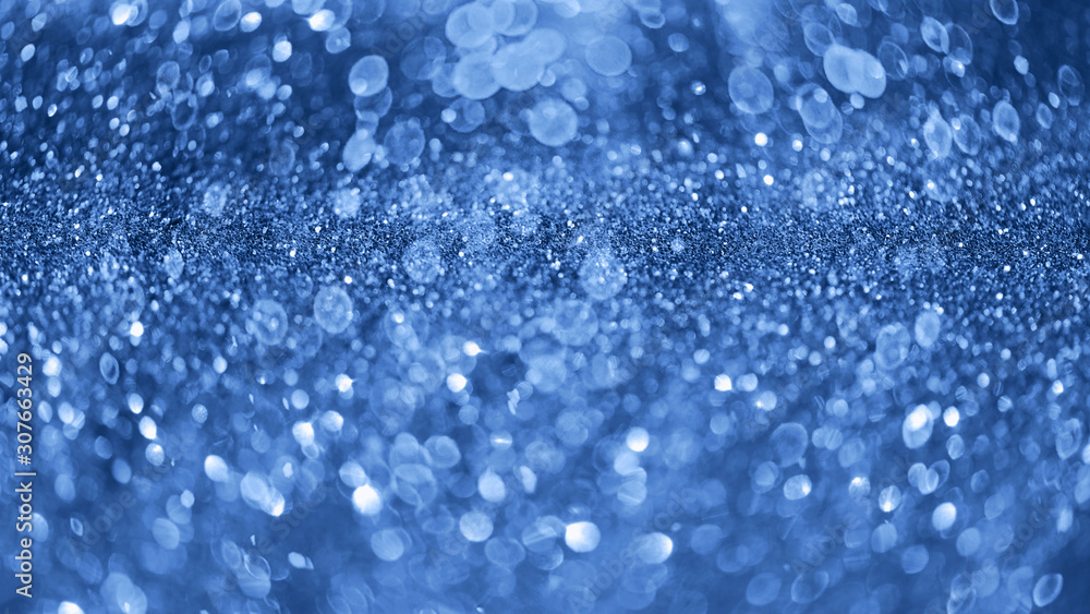 Holiday abstract texture. Christmas card with copy space. ?lassic blue background bokeh, defocused lights. Holiday abstract texture. Christmas card with copy space. ?lassic blue background bokeh, defocused lights.