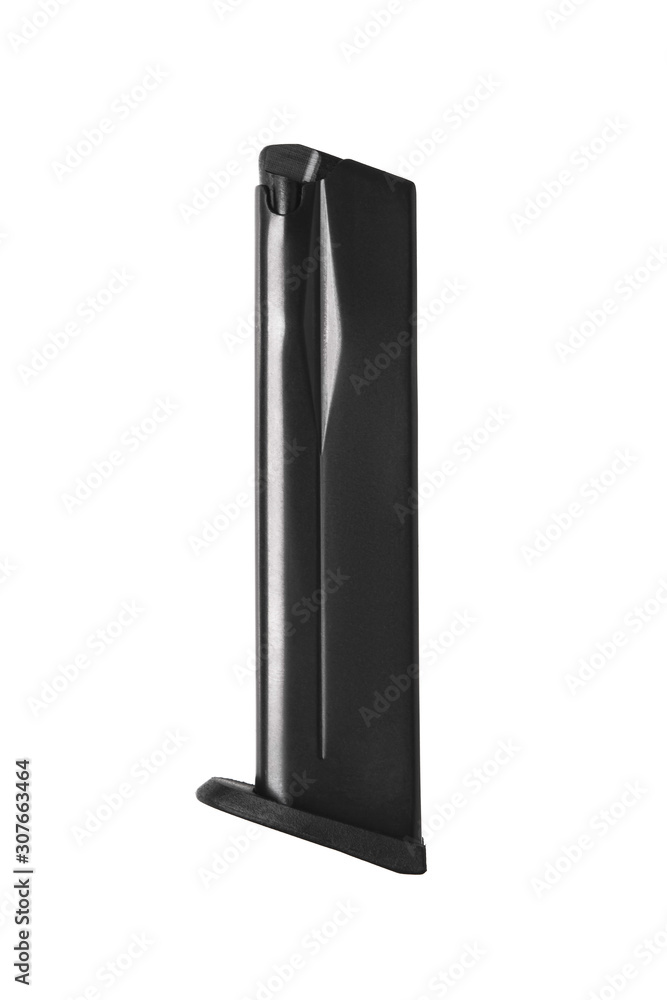 Handgun magazine on white surface. Clip for a modern semi-automatic pistol isolate on a white background. Handgun magazine on white surface. Clip for a modern semi-automatic pistol isolate on a white background.