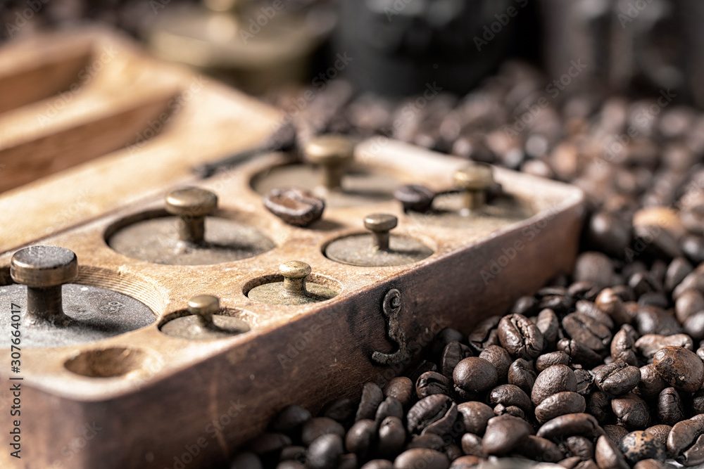 metal weights and coffee beans