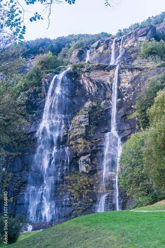 The cascades of acquafraggia, one of the most beautiful and fascinating waterfalls in the italian alps, near the town of Chiavenna, Italy - October 2019.