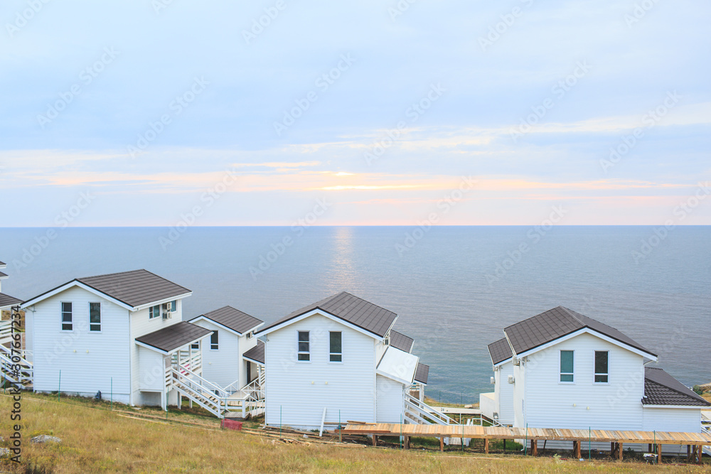 White wooden house by the sea for relaxation. Hotel. White wooden house by the sea for relaxation. Hotel.