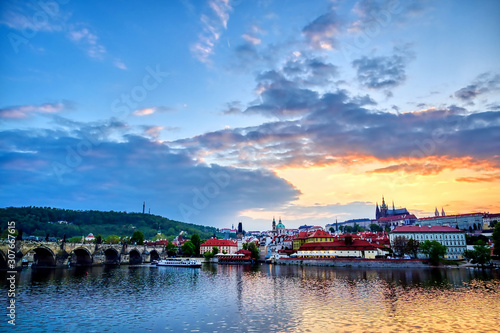 A view of Prague Castle and the Charles Bridge across the Vltava River in Prague, Czech Republic.