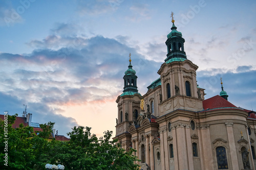 The St. Nicholas Church and the streets of Prague, Czech Republic. © Jbyard