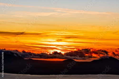 Sunset over Ocean, Clouds, Mountains 