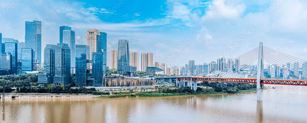 Naklejka premium High rise buildings and dongshuimen bridge in Chongqing, China