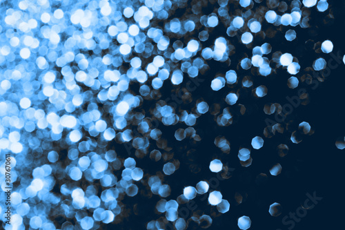 Defocused Blue shiny abstract background.