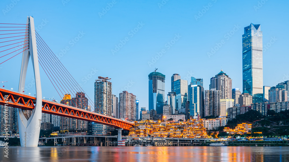 Fototapeta premium Night view of Hongyadong and skyline along Jialing River in Chongqing, China