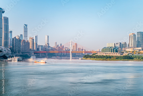 A close-up of the sunny scenery of high-rise buildings and Bridge cities in Chongqing, China
