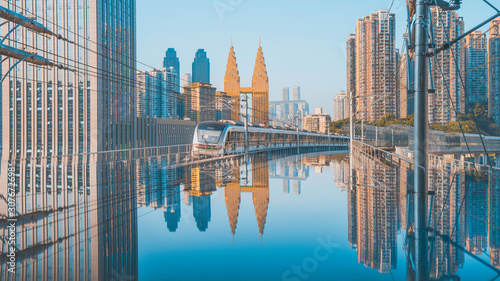 Foto Light rail platform and high-rise buildings in Chongqing, China