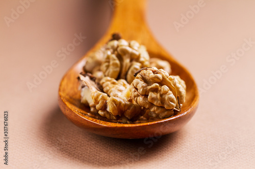 Still life with nuts on natural wood.