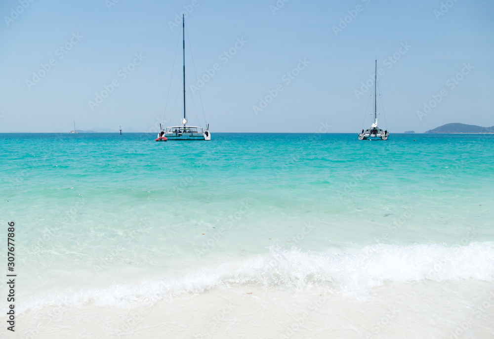 Whitehaven Beach on the Whitsunday Island, the largest island of the Whitsunday Islands archipelago in Queensland, Australia Whitehaven Beach on the Whitsunday Island, the largest island of the Whitsunday Islands archipelago in Queensland, Australia