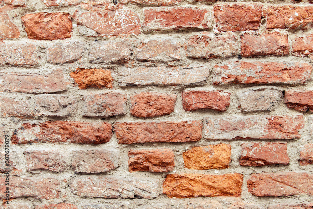 Obraz premium old red brick and cement wall