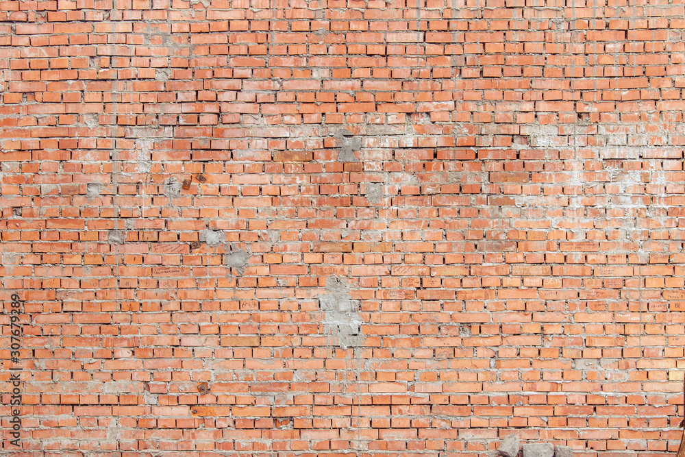 Naklejka premium old red brick and cement wall