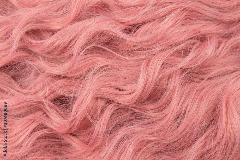 Naklejka premium Pink wavy hair pattern. Top view.
