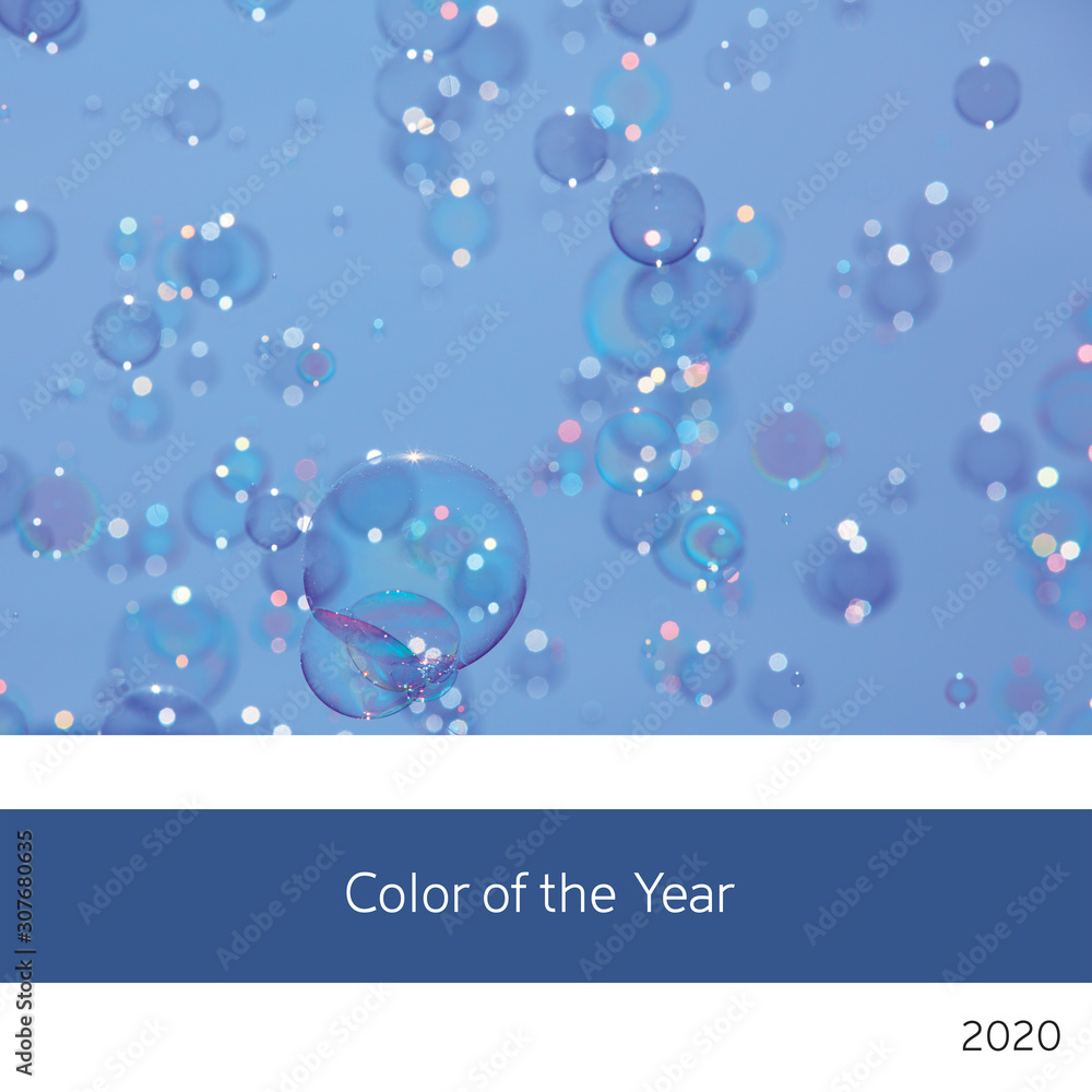 Soap bubbles and blue sky colour of the year 2020