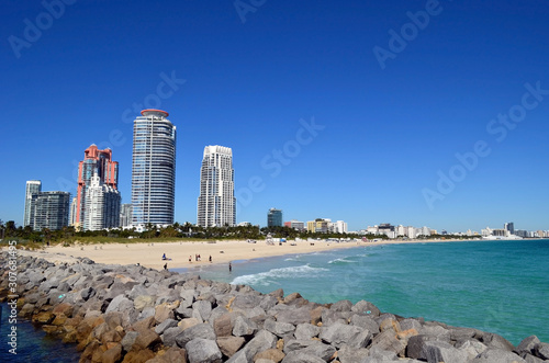 Panoramic view of luxury condo towers and the beaches of Miami Beach looking north from Southpointe Park beach . photo