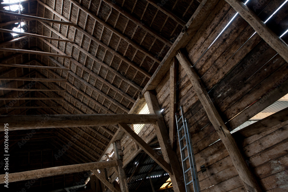 Old wooden barn in Ruinerwold Drenthe Netherlands. With straw roofing. Interior of a farmhouse. Countrylife.