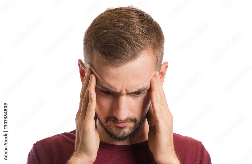 Portrait of guy holding hands on temples, headache concept Portrait of guy holding hands on temples, headache concept