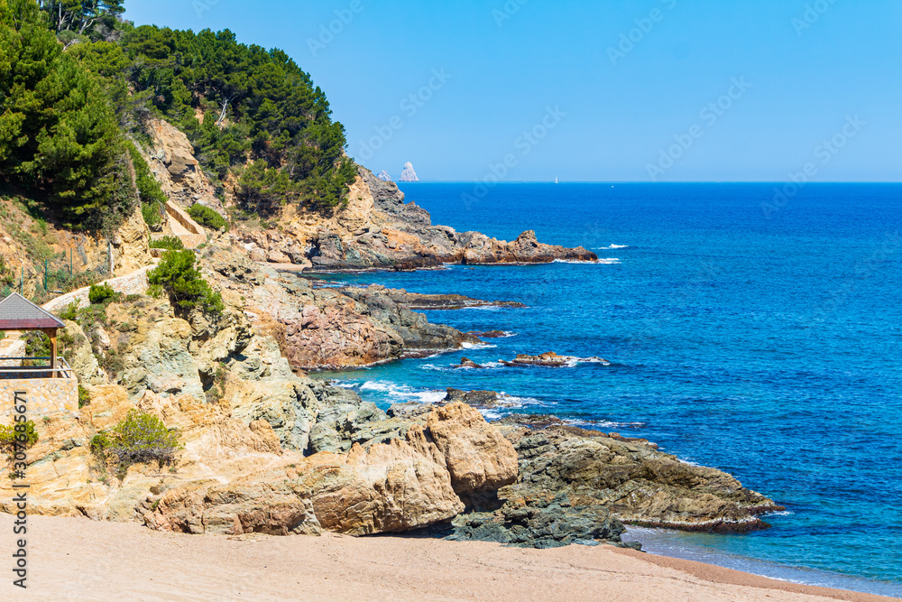 View of the trail on the left side of the Sa Riera cove that goes to Pals beach, Begur, Costa Brava, Catalonia, Spain