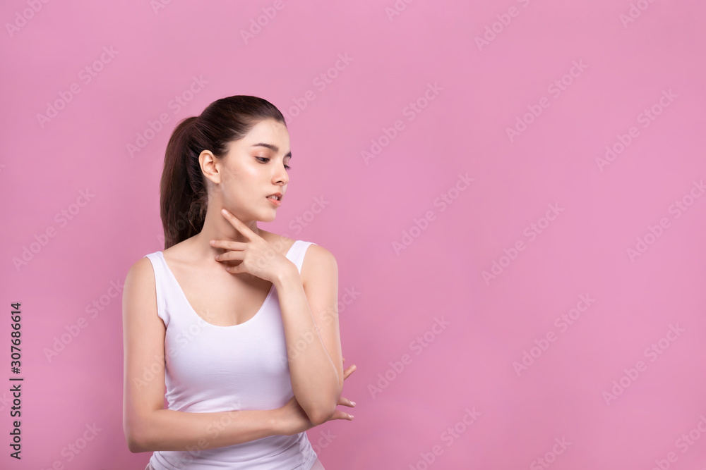 Beautiful Young Mix Asian Caucasian woman with clean fresh white skin touching face with fingers softly in beauty pose. Facial treatment, cosmetic, spa, make up and surgery advertisement. Beautiful Young Mix Asian Caucasian woman with clean fresh white skin touching face with fingers softly in beauty pose. Facial treatment, cosmetic, spa, make up and surgery advertisement.