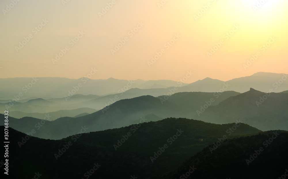 Landscape, sunset in the sky against the mountains, mountain ranges during sunset Landscape, sunset in the sky against the mountains, mountain ranges during sunset