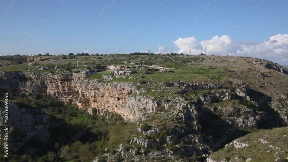 Murgia of Matera rocky plateau landscape on sunny day Murgia of Matera rocky plateau landscape on sunny day