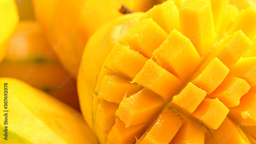 close up Mango fruit and mango cubes macro photography texture background close up Mango fruit and mango cubes macro photography texture background