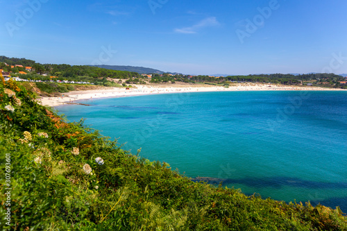 Idyllic bay with white sandy beach at the death coast, Laxe, Galicia, Spain photo