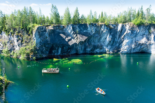 Rocks and lake of marble canyon in Ruskeala photo