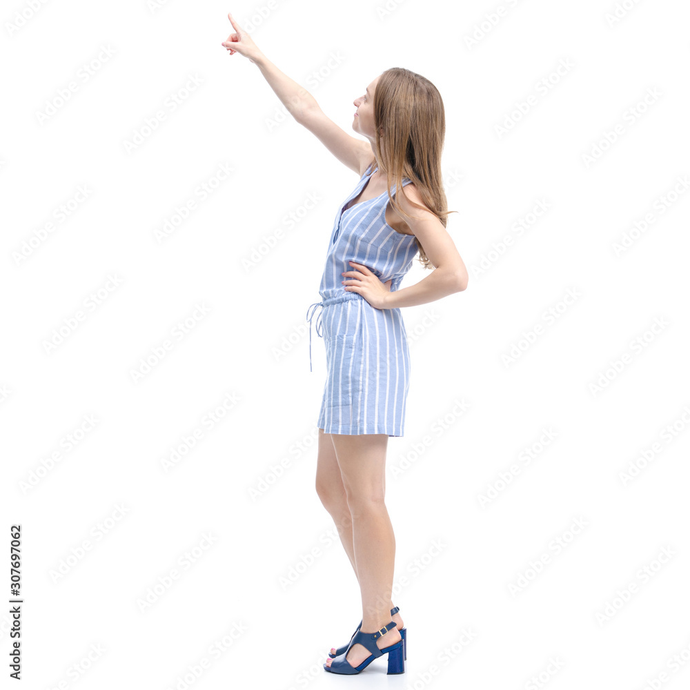 Fototapeta premium Woman in blue overalls fashion happiness smiling showing pointing on white background isolation
