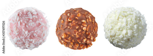 Set of three spherical candies with different fillings, nuts and coconut shavings, isolated on a white background. Full sharpness across the entire field of the frame. photo