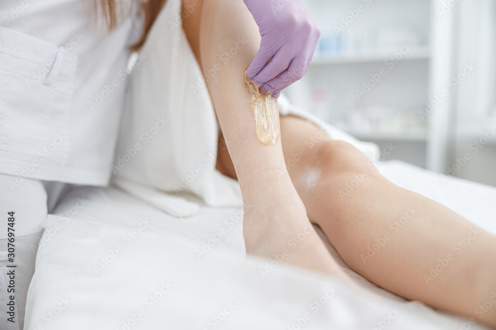 young girl in beauty salon, laser epilation and beauty young girl in beauty salon, laser epilation and beauty