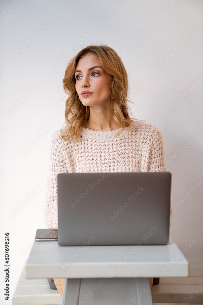 Concentrated young blonde woman sit in cafe Concentrated young blonde woman sit in cafe