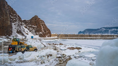 Fototapeta Naklejka Na Ścianę i Meble -  Snow Plow With Winter Landscape
