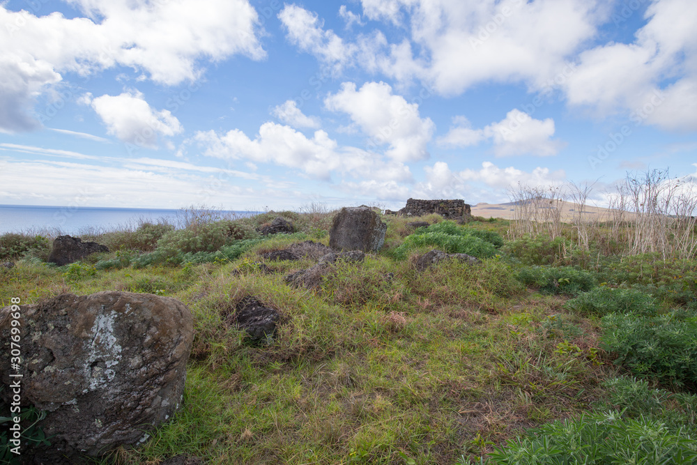 Remains of stone structures along the northern coast of Easter Island. Easter Island, Chile