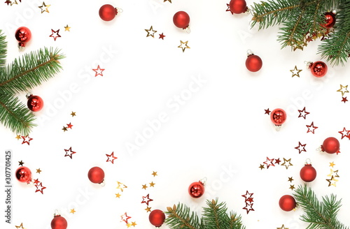 Christmas background with fir twigs and  Xmas or new year red color decoratio...