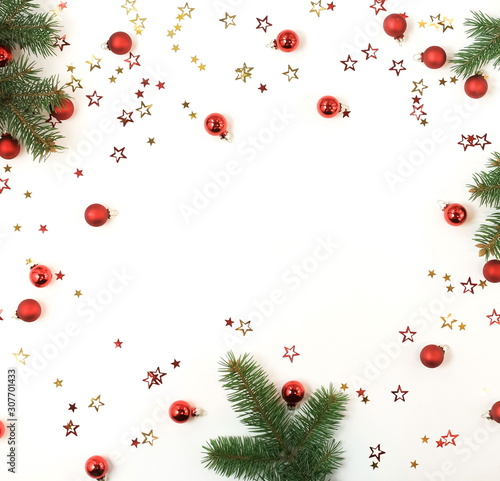 Christmas background with fir twigs and  Xmas or new year red color decoratio...