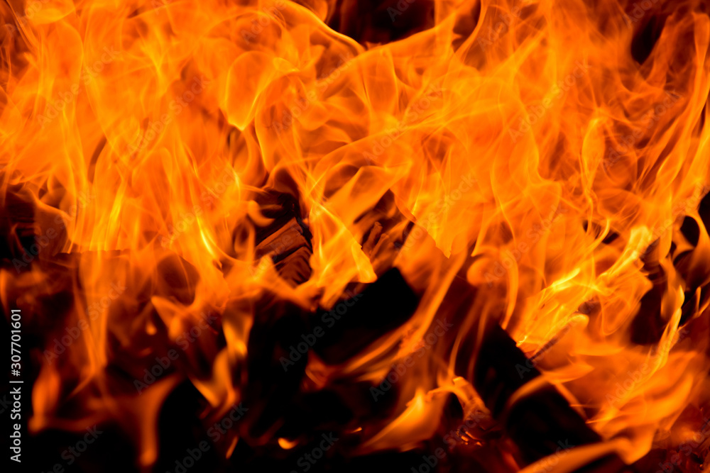 Real wood cinder charcoal burning with a fire sparks it dangerous but beautiful giving a warm and scary feeling at the same time Real wood cinder charcoal burning with a fire sparks it dangerous but beautiful giving a warm and scary feeling at the same time