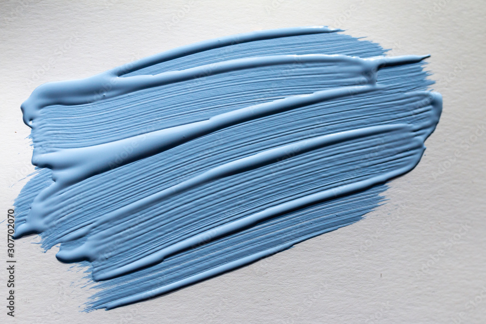 Blue colored paint brush stroke