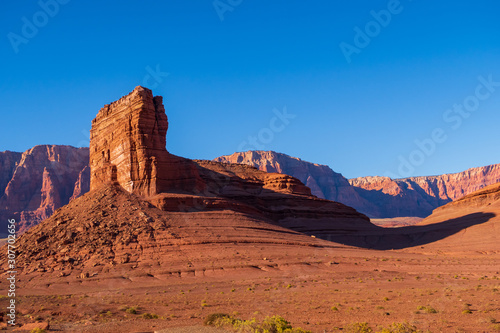 Landscape of barren red hillside and terrain at Marble Canyon in Glen Canyon National Recreation Area in Arizona