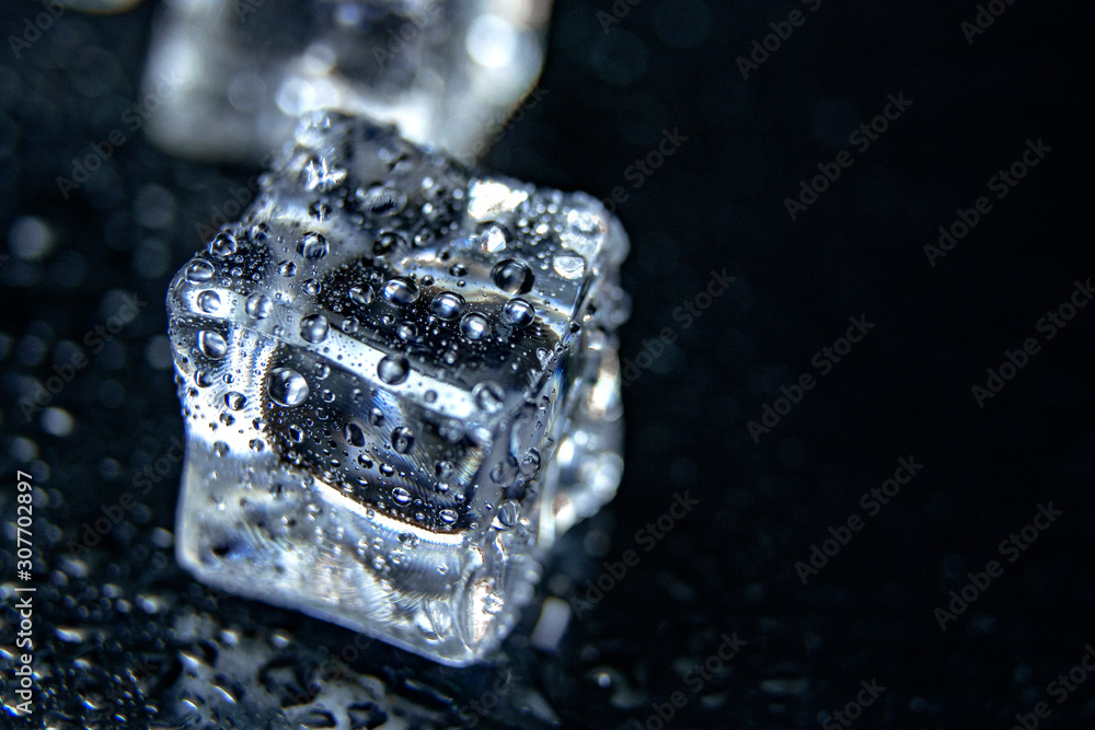 Macro photo ice cubes with drops water clean on black background banner Macro photo ice cubes with drops water clean on black background banner