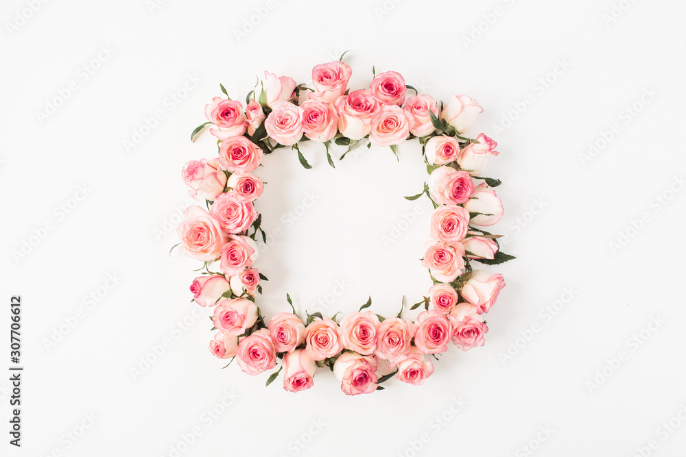 Square frame border of pink rose flower buds on white background. Mockup blank copy space. Flat lay, top view floral composition.
