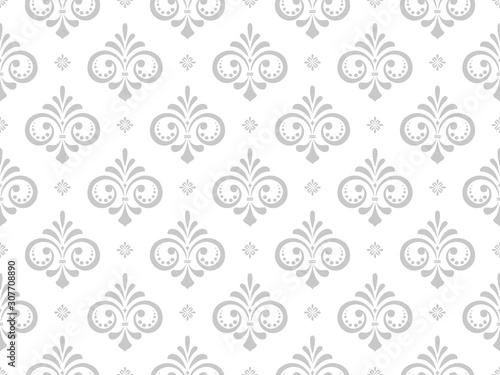 Wallpaper in the style of Baroque. Seamless vector background. White and grey floral ornament. Graphic pattern for fabric, wallpaper, packaging. Ornate Damask flower ornament.