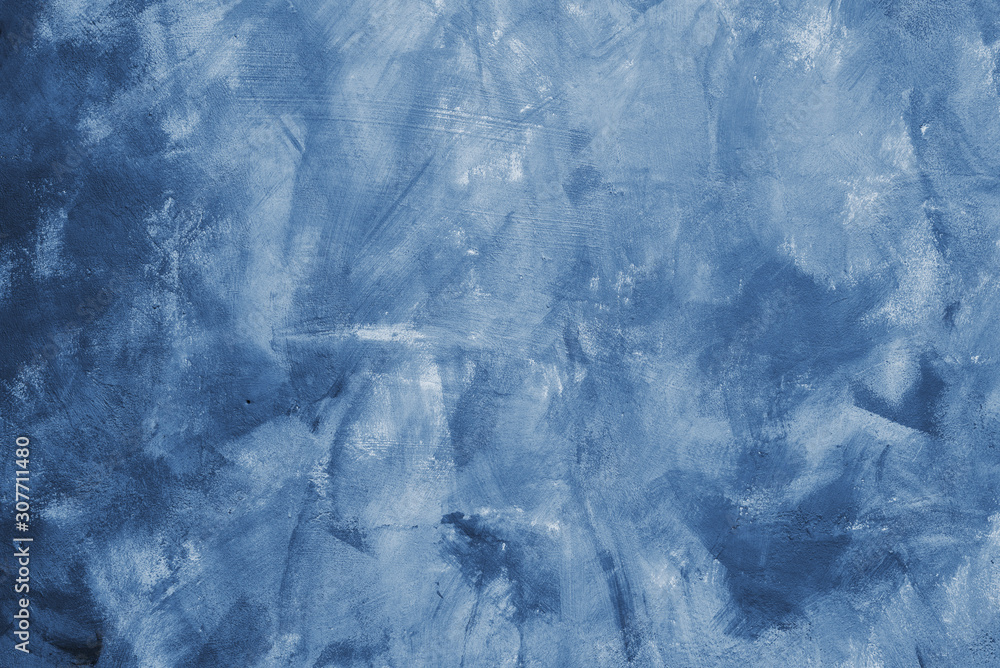 Obraz premium Smears of classic blue paint on the wall. Concrete designer wall color 2020. Fashionable classic blue pantone color of spring-summer 2020 season from New York fashion week. Modern mock up 